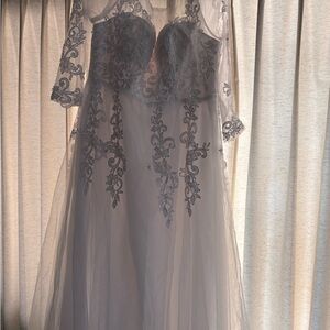 Elegant Sheer Lace Gown (note) This suit’s sleeves are not elastic and run small